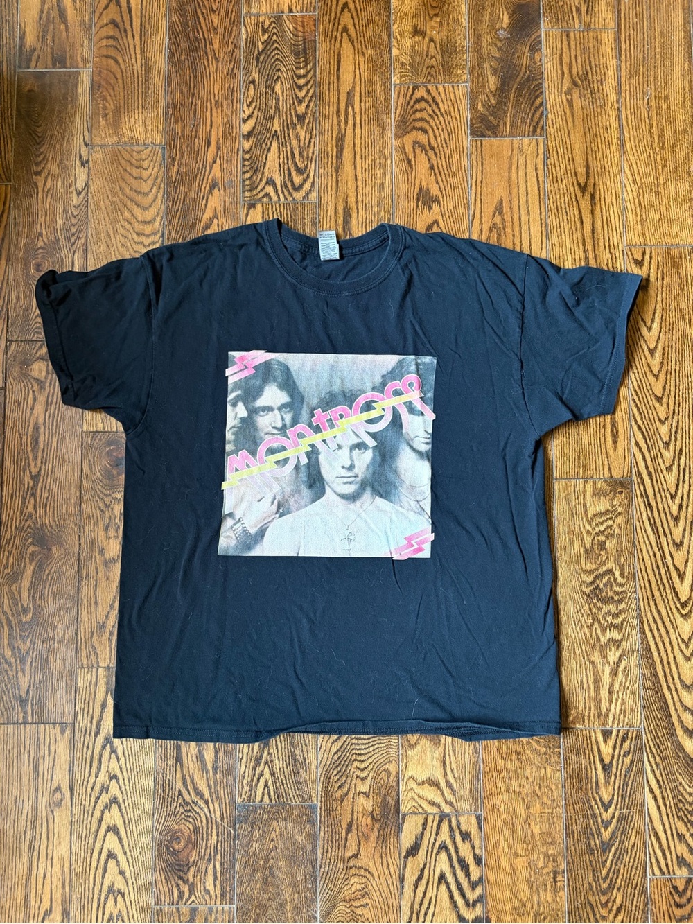 Black Graphic Band Tee with Retro Pink Accent